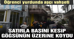 Satırla başını kesti, göğsüne koydu